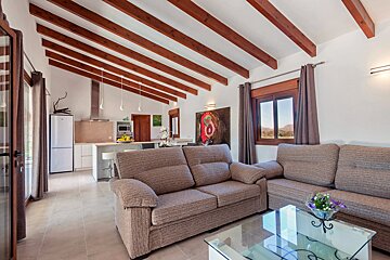 A living room with a couch and a coffee table