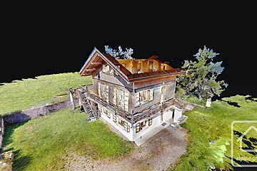 An aerial view of a house with the word alpine on the bottom