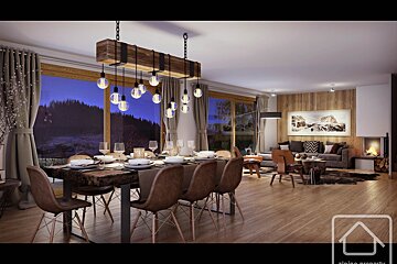 Cozy cabin dining area with a rustic light fixture, wooden table, and leather chairs next to a living room with a fireplace.