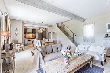 A living room with a couch and a coffee table