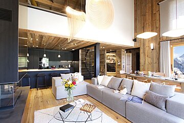 A living room with a couch and a coffee table