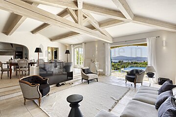 A living room with a large flat screen tv