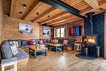 A living room with a fireplace and a couch