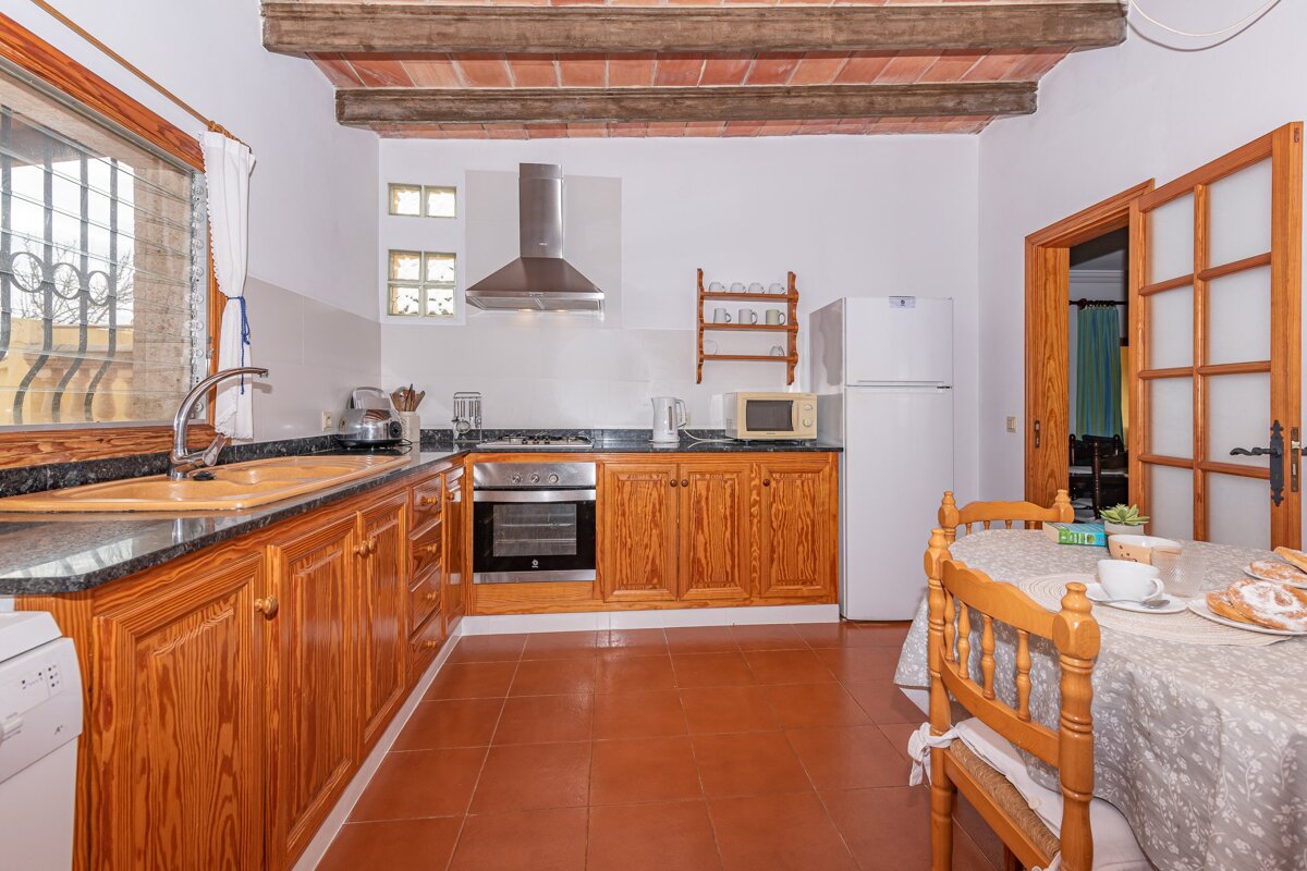 A kitchen with a refrigerator that says lg on it