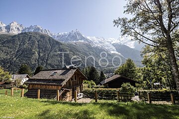 A picture of a mountain with the number ten80 on the bottom