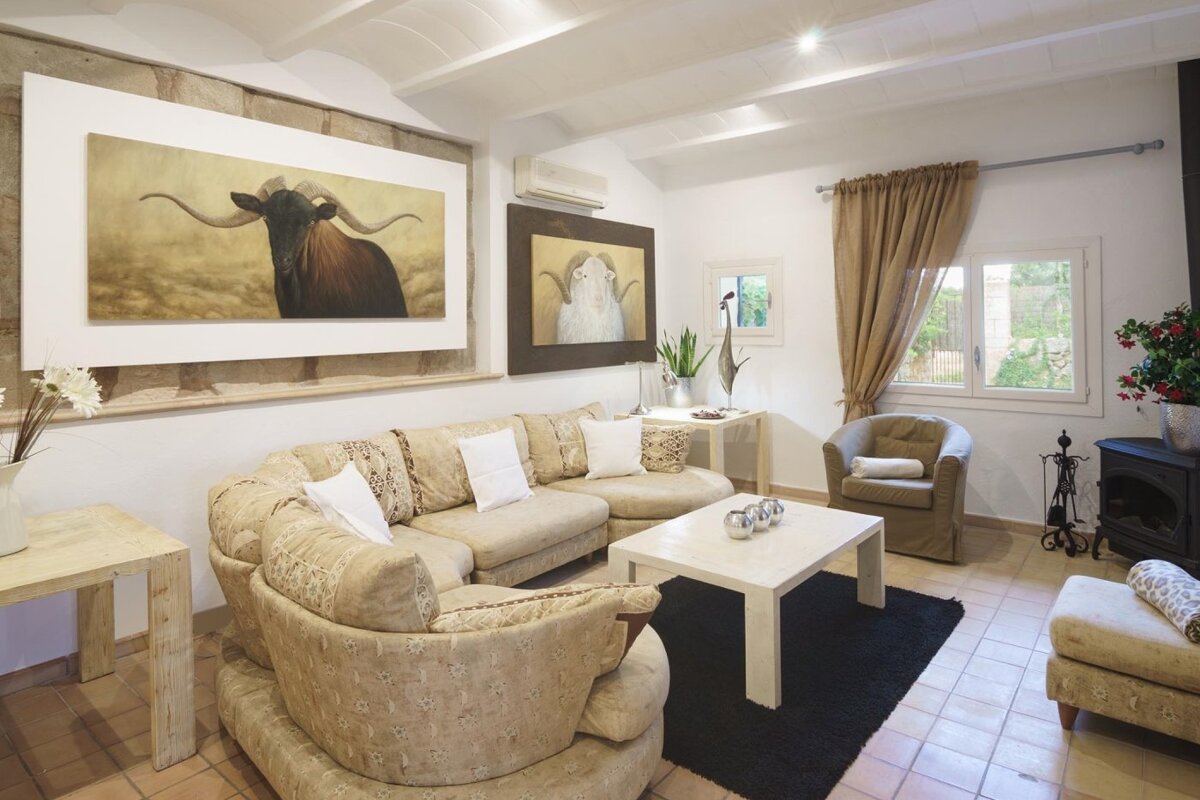 A living room with a couch a chair and a coffee table