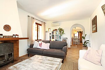A living room with a couch and a coffee table