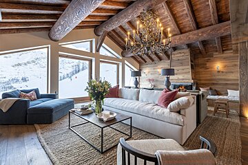 A living room with a couch and a coffee table