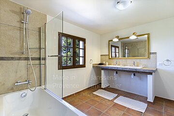 A bathroom with the words made in provence on the wall