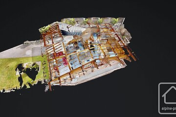 An aerial view of a house with the word entree visible