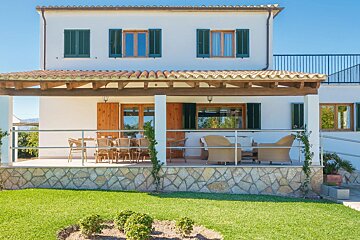 A wooden table with a tray of food on it