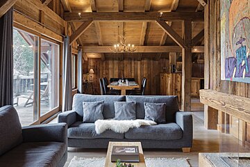 A living room with a couch and a coffee table