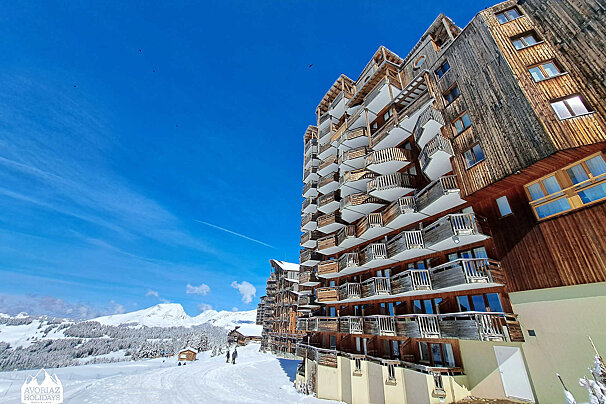 A picture of a building with the words austrian holidays on the bottom