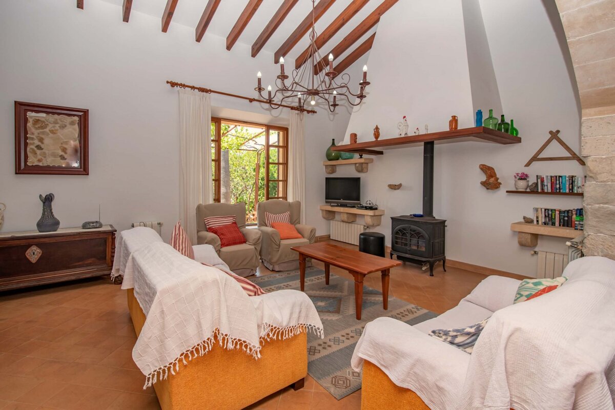 A living room filled with furniture and a television