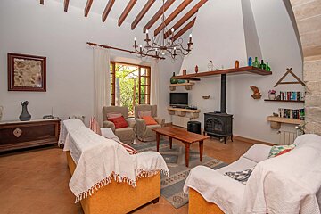 A living room filled with furniture and a television