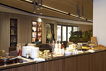 A counter with a sign that says ' buffet ' on it