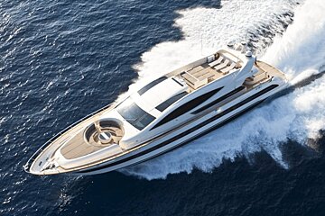An aerial view of a luxury yacht in the ocean