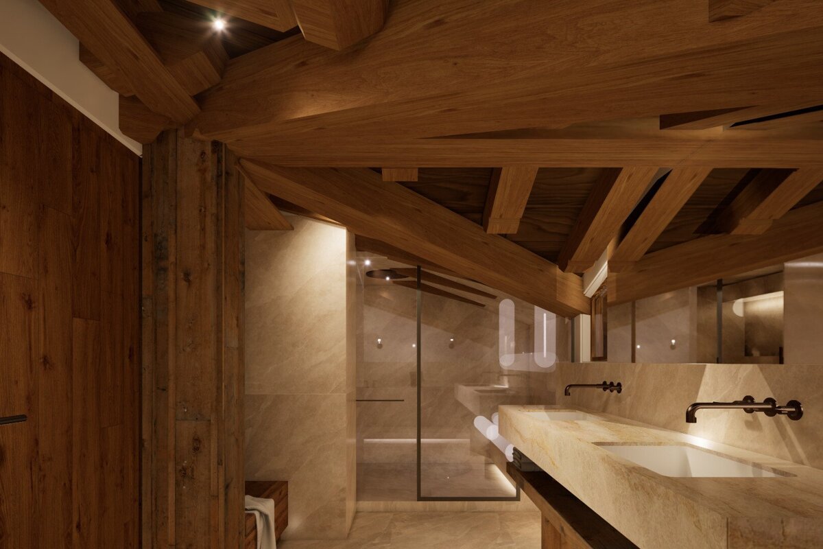 A bathroom with wooden beams and two sinks