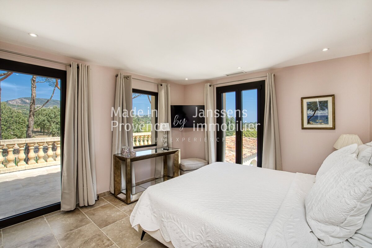 A bedroom with the words made in provence by immobilier on the wall