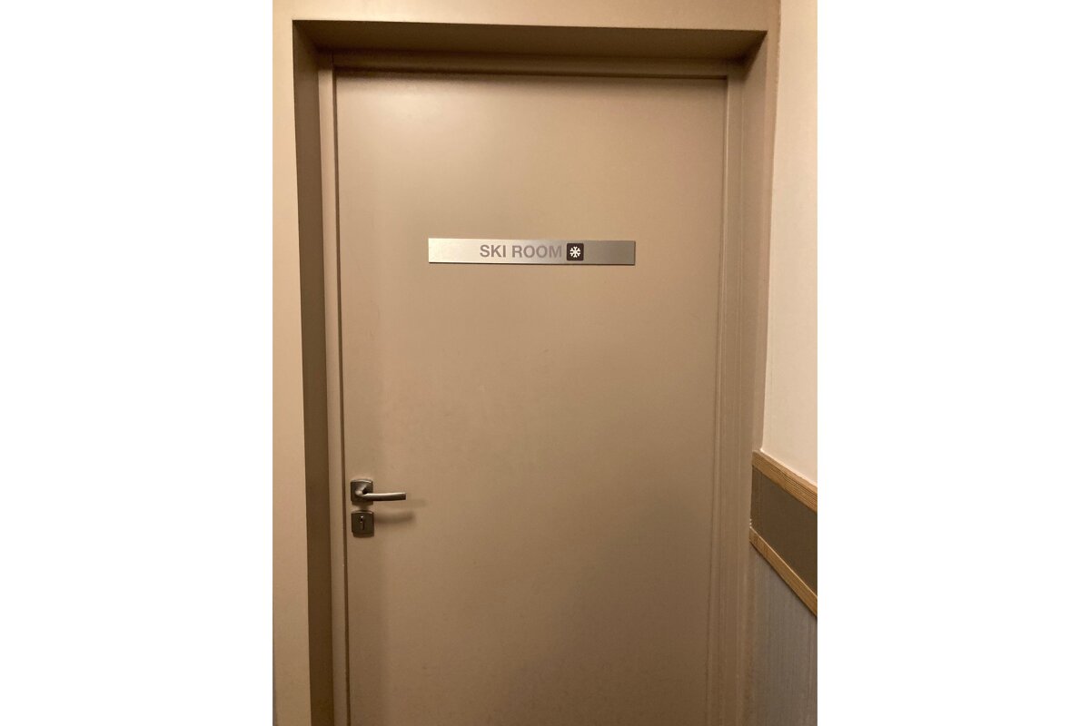 A door that says ski room on it