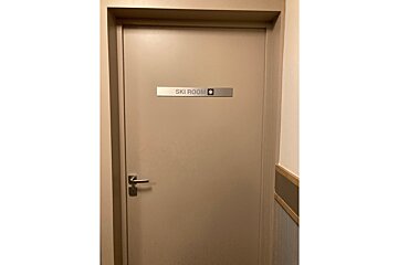 A door that says ski room on it