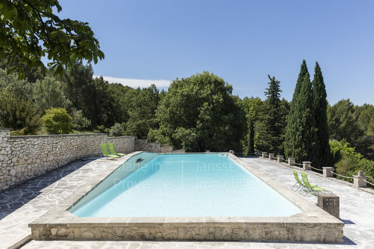 A large swimming pool with the words made in provence visible