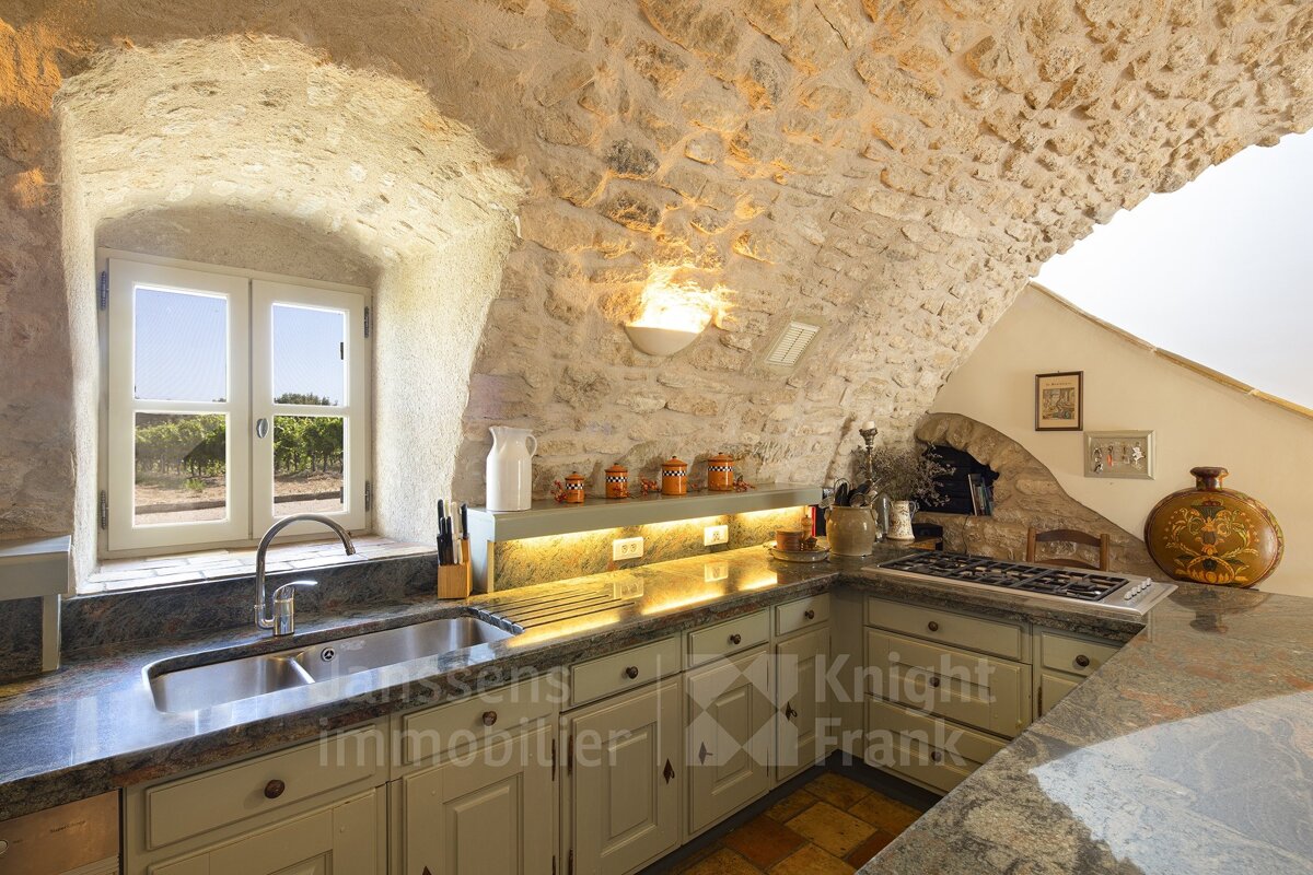 A kitchen with knight frank written on the counter