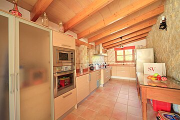 A kitchen with a bag that says sv on it