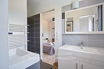A bathroom with the words made in provence by immobilier on the wall