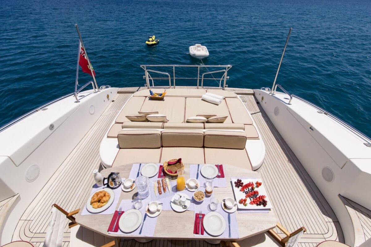 A table set up on the back of a boat in the ocean