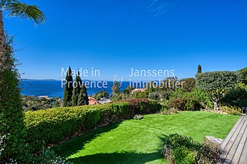 A picture of a garden with the words made in provence by janssens immobilier