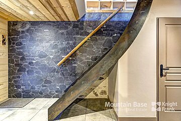 A picture of a staircase with the words mountain base on the bottom