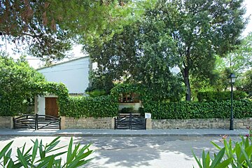 A house with a sign that says ' a ' on it