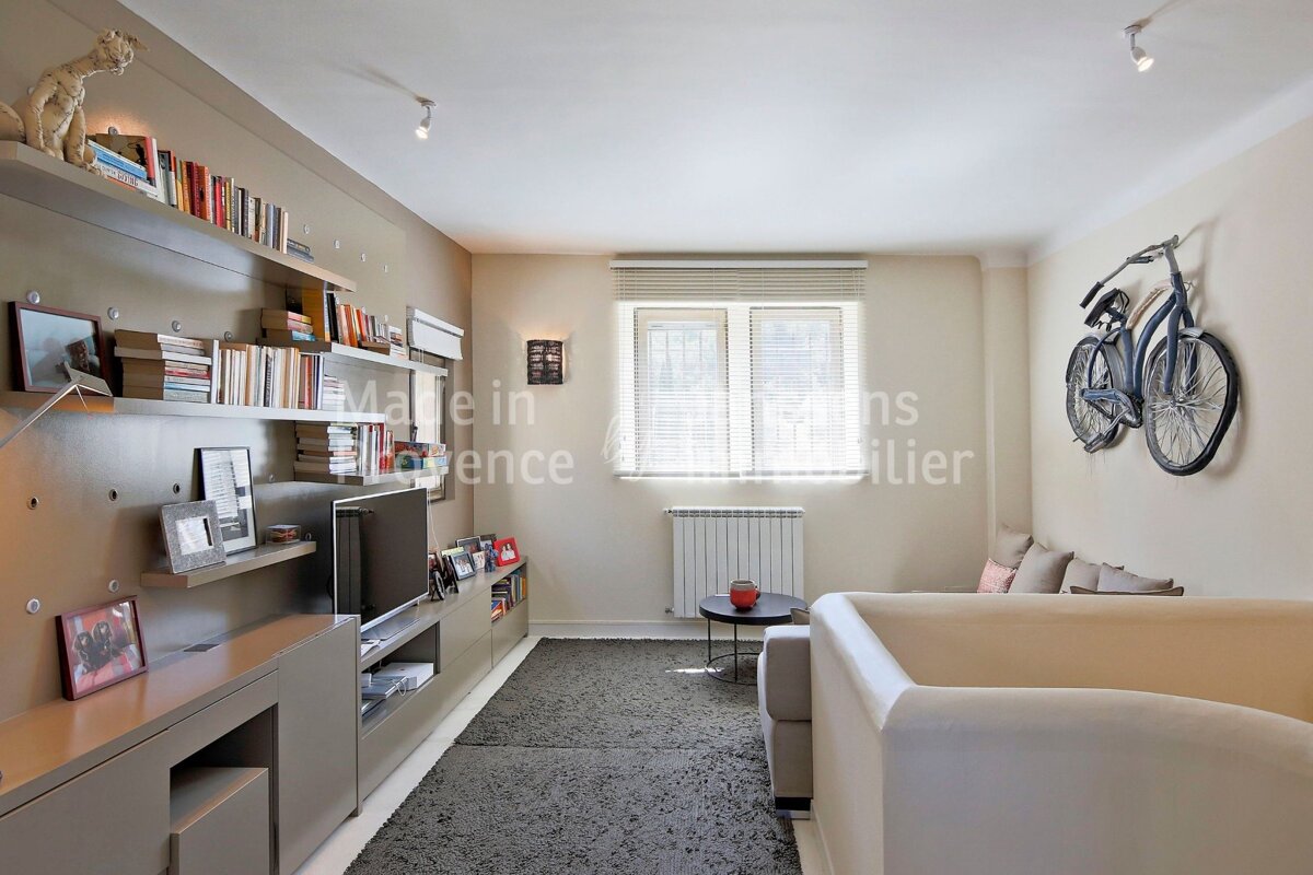 A living room with the words made in provence written on the wall