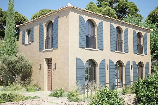 A house with arched windows and blue shutters