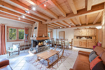 A living room with a fireplace and a couch
