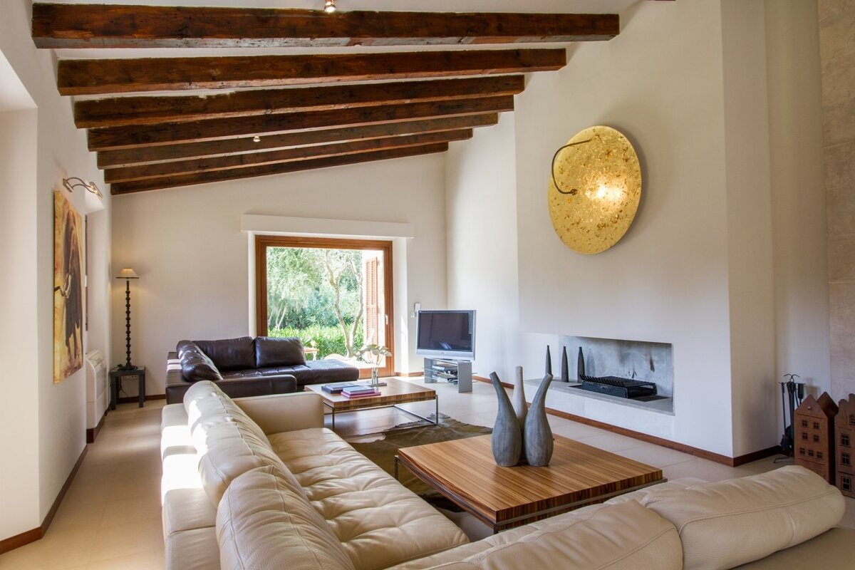 A living room with a couch and a television