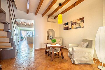 A living room with a chair and a table