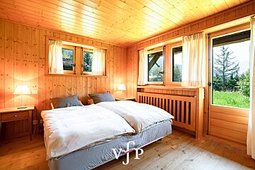 A bedroom with two beds and a sign that says vip