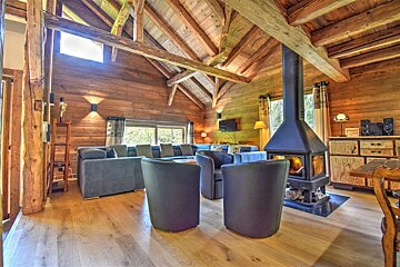A living room filled with furniture and a fireplace