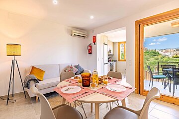 A room with a fire extinguisher on the wall