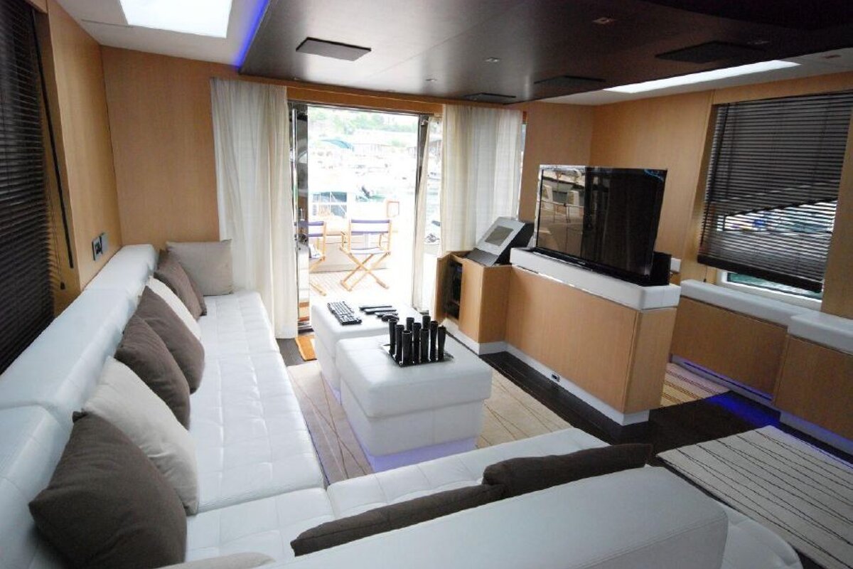 A living room with a couch and a flat screen tv