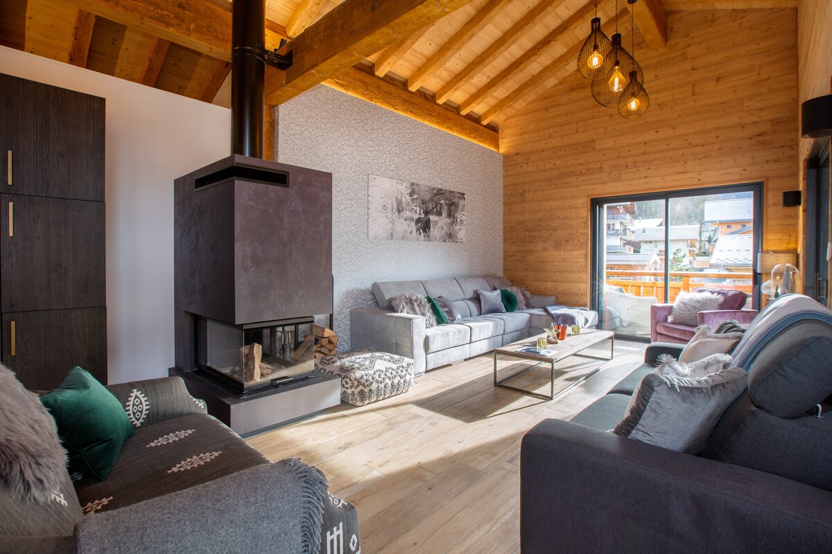 A living room with a fireplace and a couch