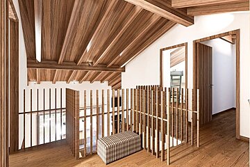 An inviting modern attic space showcases a striking slanted wooden plank ceiling, matching floors, and vertical slat railings, complemented by white walls and a mirror.