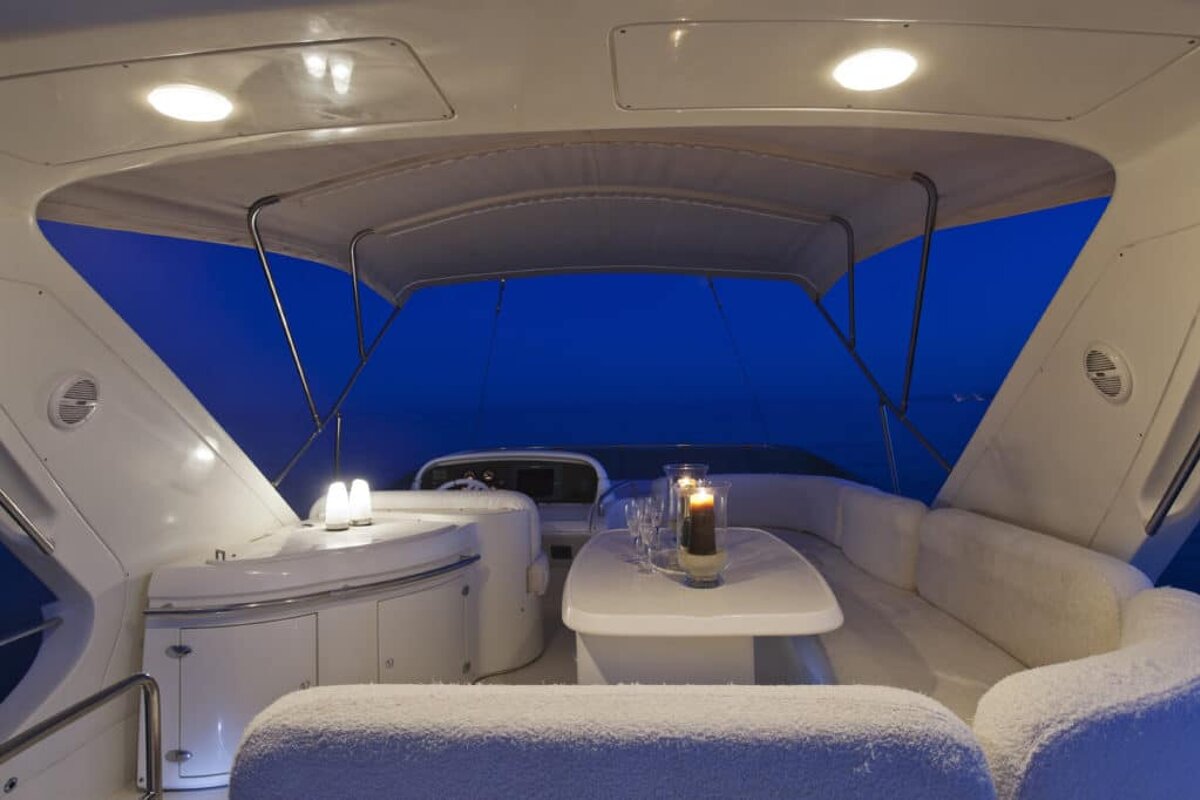 A boat with a table and a candle on it