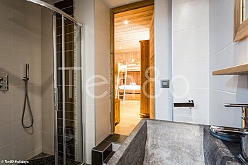 A bathroom with the word holidays on the wall