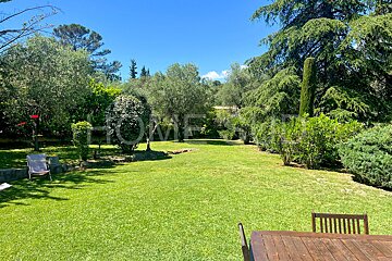 A lush green lawn with the word home written on it