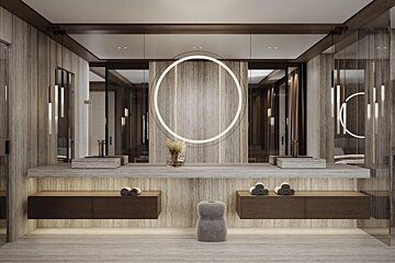 A bathroom with two sinks and a large mirror