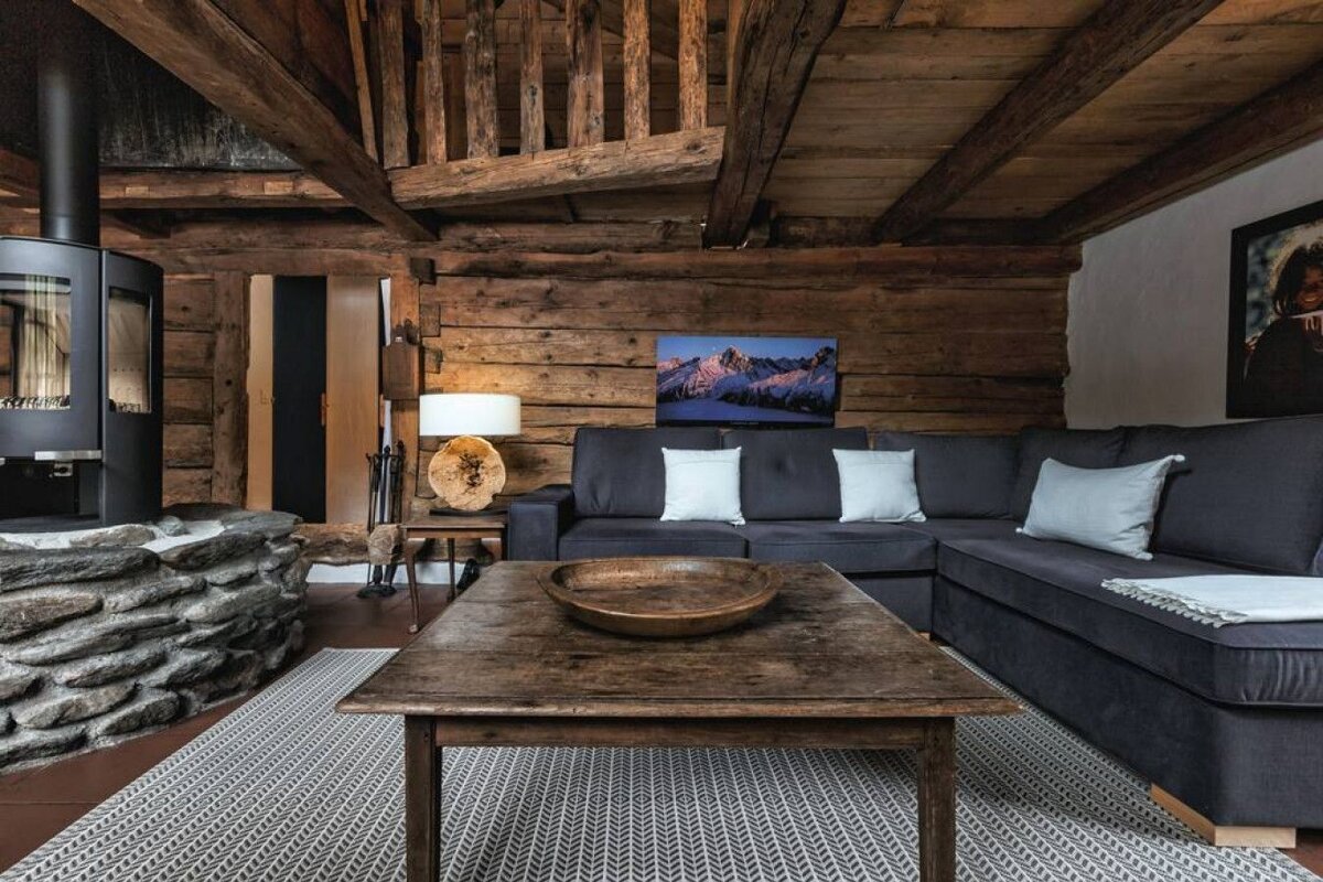 A living room with a couch and a coffee table