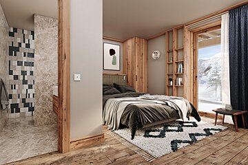 A bedroom with a large bed and a rug